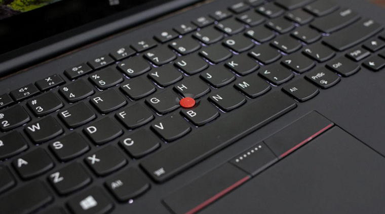 Nút màu đỏ (TrackPoint?) trên bàn phím laptop có công dụng gì?