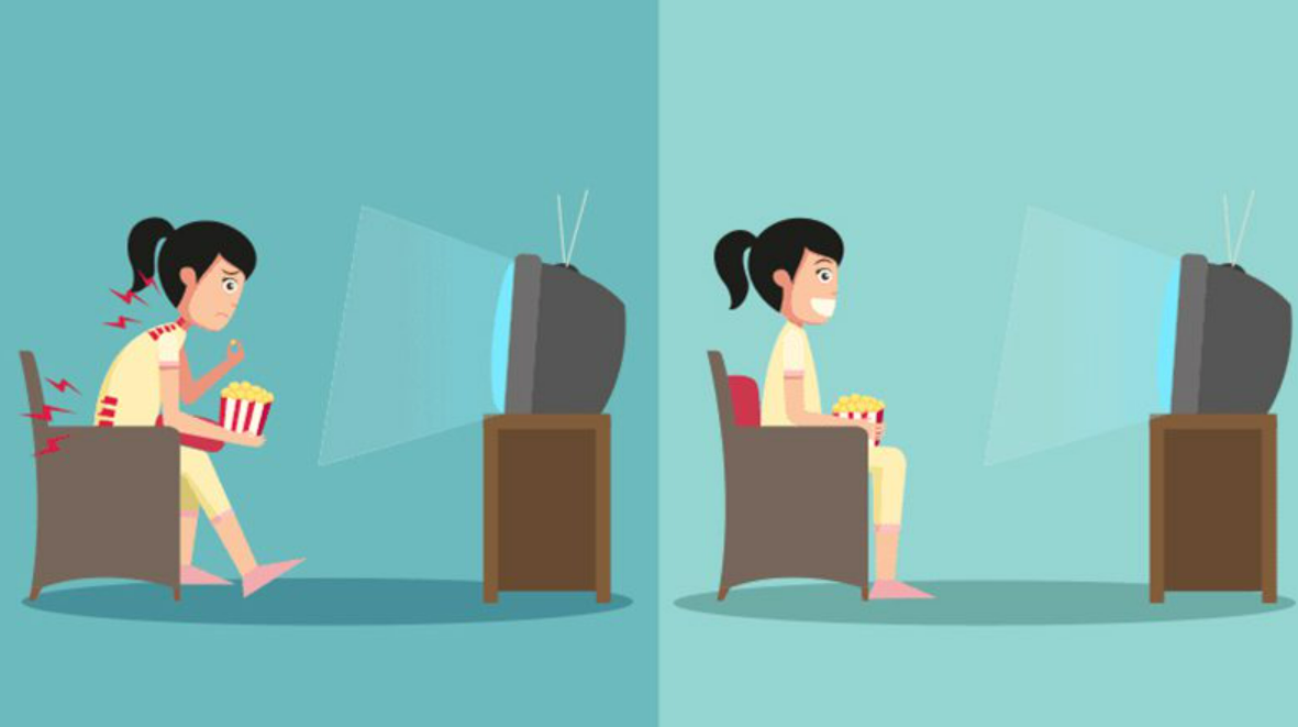 Ngồi thẳng lưng khi xem tivi để bảo vệ cột sống 